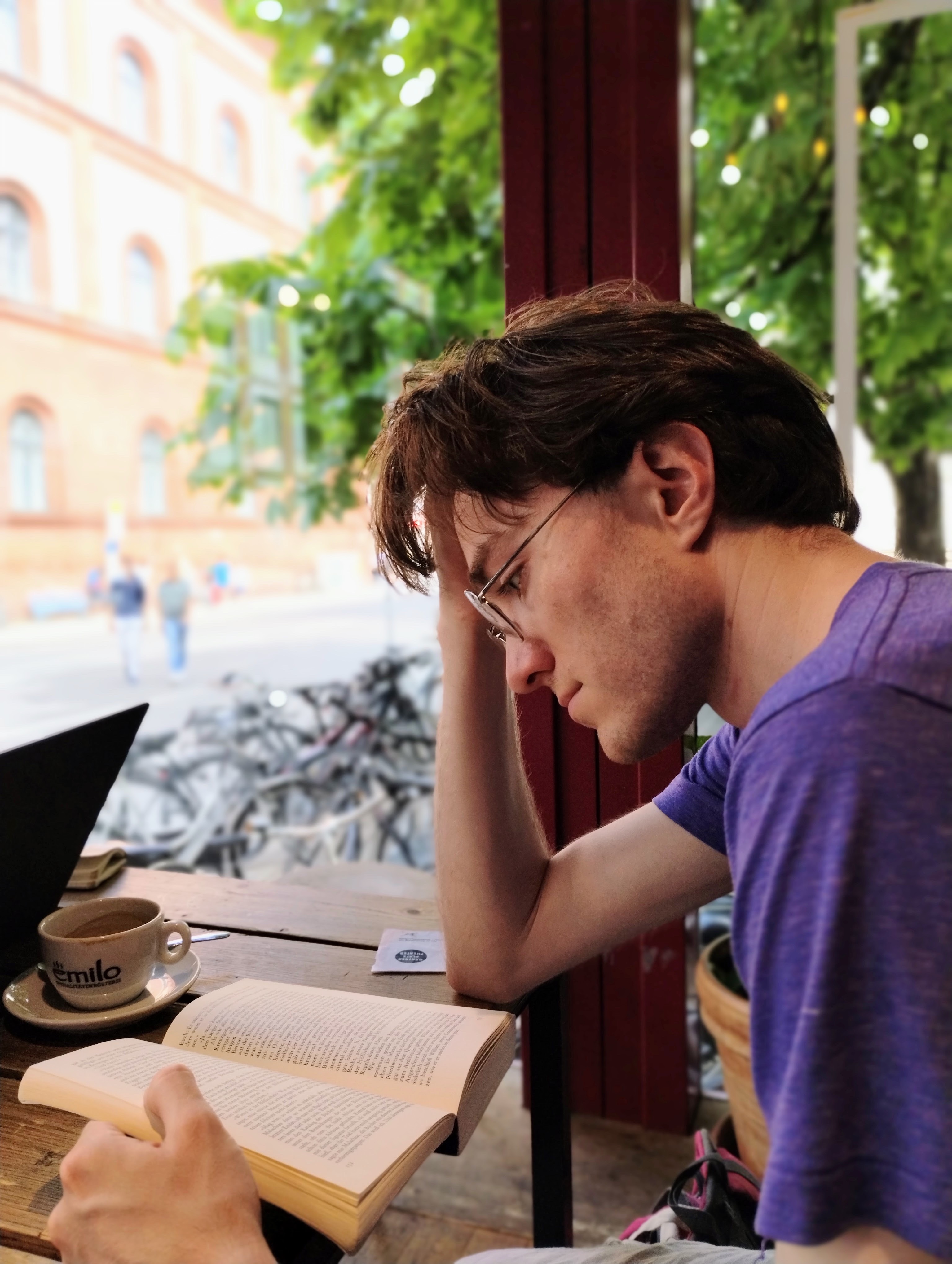 Me reading in a cafe